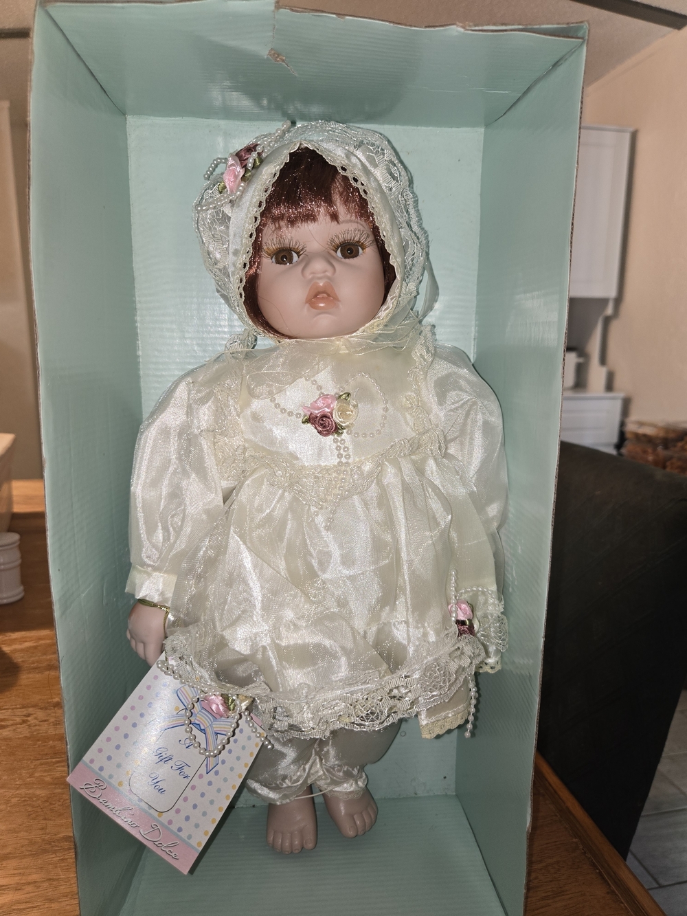 Porcelain Baby Doll in Cream Lace Bonnet